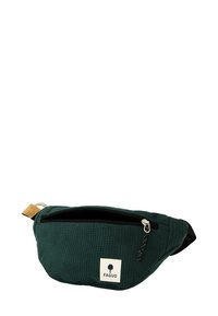 Marsupio in tessuto teal con superficie testurizzata, zip nera e dettaglio in sughero. Presenta un'etichetta con logo bianco sul davanti.