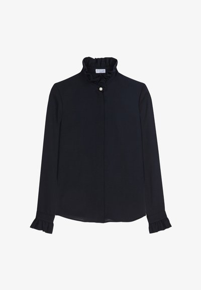 Blusa blu navy con colletto e polsini arricciati, dotata di chiusura con bottone di perla. Tessuto liscio con maniche lunghe e silhouette sartoriale.