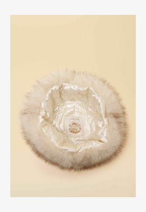 Kunstpelzmütze mit weicher, cremefarbener Außenseite und satingefüttertem Innenraum. Innen mit einem Joules-Logo versehen. Runde Form mit flauschiger Textur.