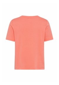 Short-sleeve t-shirt in coral pink, made of cotton. Features a round neckline and a relaxed fit, with a smooth texture and no embellishments.