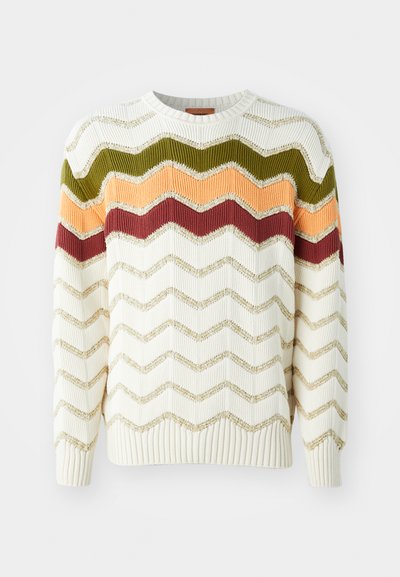 Adīts džemperis krējuma krāsā ar zigzag svītrām zaļā, oranžā, sarkanā un zelta akcentos. Arapa manžetes un ribotas apakšmalas.