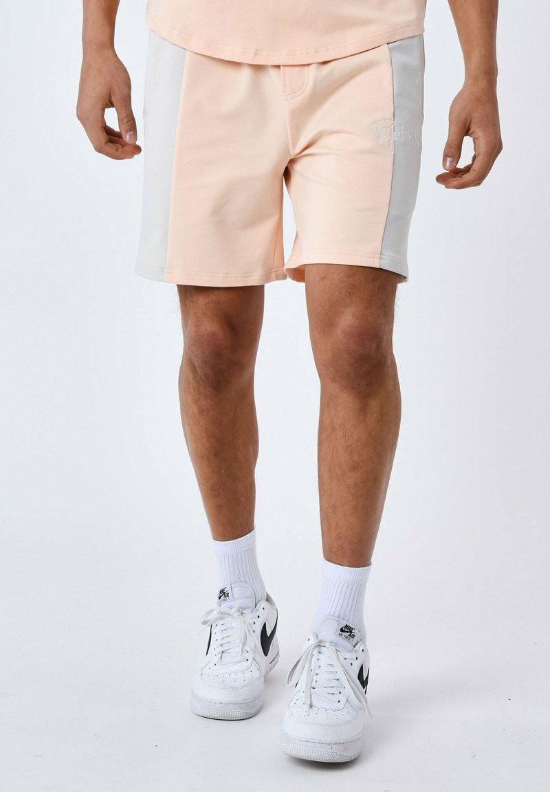 Colorblock 669 Project X Paris COLORBLOCK - Tracksuit bottoms - pêche/orange - Zalando