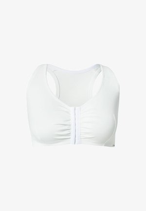 Soutien-gorge de sport blanc avec un devant froncé et un design à larges sangles. Fabriqué en tissu lisse, il possède une fermeture à crochets à l'avant.