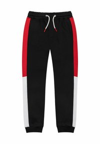 Zwarte sweatpants met rode en witte zijpanelen, gemaakt van zachte stof. Beschikt over een elastische tailleband met een trekkoord en geribbelde manchetten.