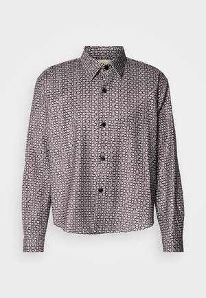 Black and white patterned shirt with long sleeves, button front, classic collar, and a subtle geometric design throughout.