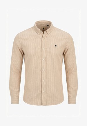 Chemise beige à manches longues avec fines rayures verticales, col à boutons et petit logo noir en forme d'arbre sur la poitrine gauche.