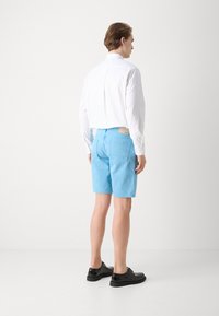 BOSS ANDERSON - Relaxed & Loose Fit - Shorts di jeans - open blue