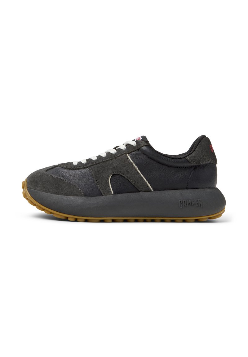 Black and dark gray sneaker featuring suede and leather materials, white laces, rubber sole with a textured gum outsole, and brand logo on heel.