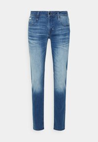 OZZY  SUSTAINABLE POWER  - Calças de ganga de corte afunilado - blu denim