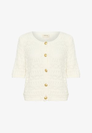Cardigan beige tricoté avec des manches courtes, un col rond et cinq boutons dorés sur le devant. Motif texturé ouvert sur l'ensemble.