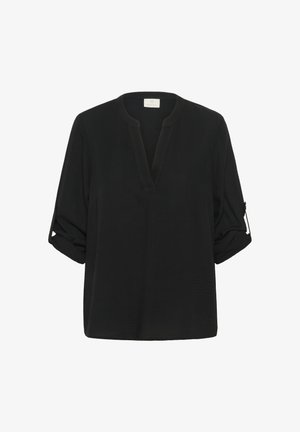 Melna blūze ar V veida kakla izgriezumu un sarullētām piedurknēm. Izgatavota no teksturēta auduma, ar brīvu piegriezumu un maziem sānu akcentiem. Vienkāršs dizains.