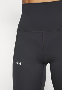 Under Armour MERIDIAN ULTRA - Tamprės - black/white