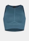 SEAMLESS BRA - Sportmelltartó közepesen nehéz sportoláshoz - green