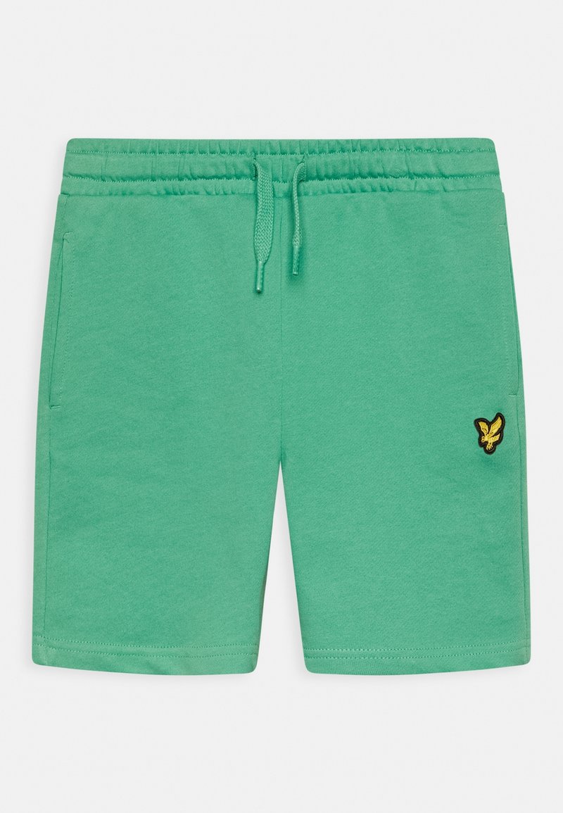 Green casual shorts with elastic waistband, drawstring, side pockets, and a small yellow bird logo on the right leg.