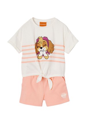 White short-sleeve top with pink stripes and cartoon dog wearing goggles, paired with light pink shorts featuring a small Paw Patrol logo.