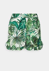 Vihreälehtikuvioiset shortsit valkoisella taustalla, joissa on röyhelöreuna ja joustava vyötärö mukavuutta varten.