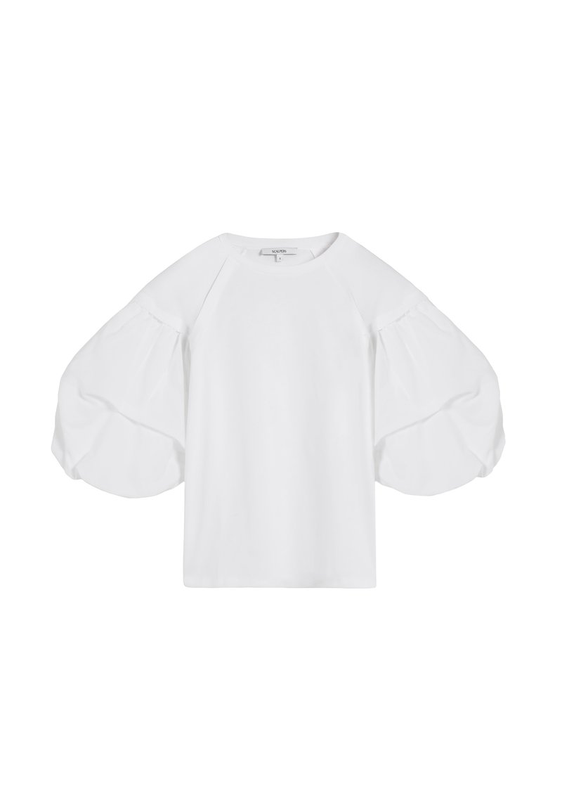 Blusa blanca con escote redondo y mangas abullonadas de gran tamaño que llegan hasta los codos, fabricada con un tejido ligero.