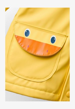 Geltona lietpaltis su dideliu priekinio kišenės dizainu, primenančiu antis, su oranžiniu snapu ir mėlynomis akimis. Lygi, vandeniui nepraleidžianti medžiaga.
