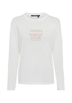 White long-sleeve T-shirt featuring front text design in pink and brown. Soft cotton material with a relaxed fit and crew neck.