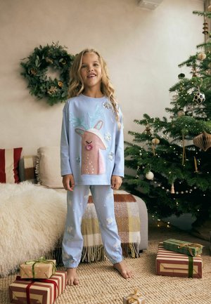 Set di pigiama azzurro chiaro con un design di renna decorato con paillettes e orecchie sulla maglietta, e pantaloni con fantasia di piccoli unicorni.