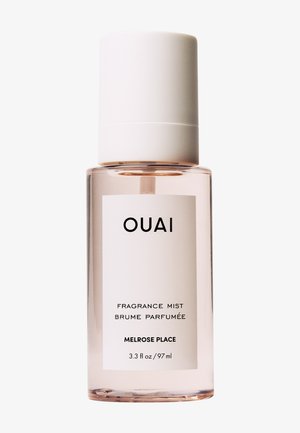 Selkeä lasipullo, jossa on valkoinen korkki ja OUAI Melrose Place -tuoksusuihketta, 3,3 fl oz (97 ml).