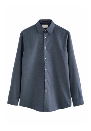 Camicia a maniche lunghe da uomo in motivo a quadri blu scuro. Realizzata in tessuto tessuto, con patta con bottoni e colletto a punta.