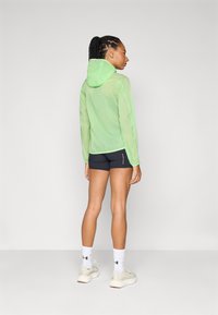 Salomon SENSE SHORT - Short running tights - deep black