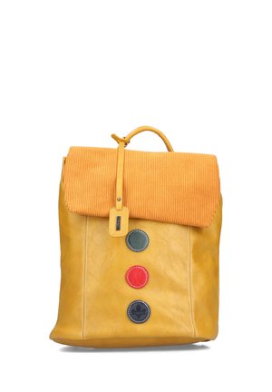 Mustard yellow backpack with an orange fabric flap and three circular buttons in green, red, and black on the front.