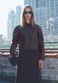 Mango Giacca in similpelle - brown
