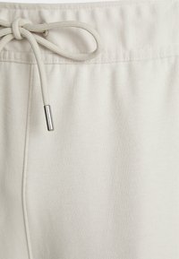 Jordan WARMUP PANT - Calças de fato de treino - light orewood