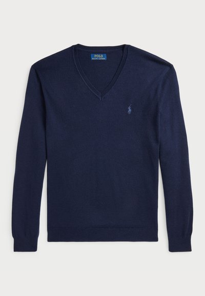 Suéter azul marino de cuello en V hecho de suave tejido de punto. Presenta mangas largas y un logo bordado en el pecho izquierdo. Diseño clásico.