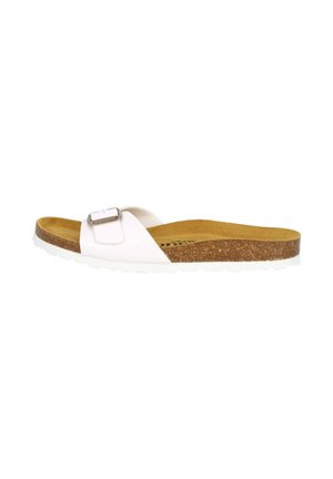 White flip-flop sandal with a buckle accent, cork footbed, and textured rubber sole. Minimalist design features a wide strap and contoured shape.