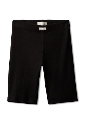 Svart ribbestrikket stoff kne-lange shorts med elastisk midjebånd og to Calvin Klein-merkelapper foran.