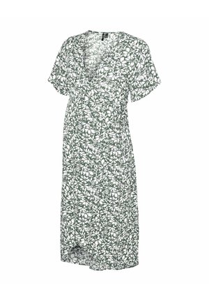 Rohelise ja valge lillemustrilise lühikeste varrukatega vöökohale seotud V-kaelusega midi pikkuses kleit.