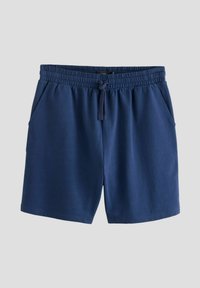 Bermudas atléticas azul marino hechas de tejido suave, con cinturilla elástica y cordón ajustable, y bolsillos laterales.