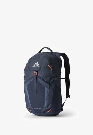Navy backpack with a textured finish, featuring orange accents, adjustable straps, and a top handle. Includes multiple compartments for storage.
