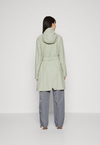 Rains CURVE JACKET UNISEX - Parkas - earth