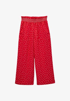 Pantalon rouge à jambes larges avec pois blancs, taille élastiquée froncée et poches plaquées à l'avant.