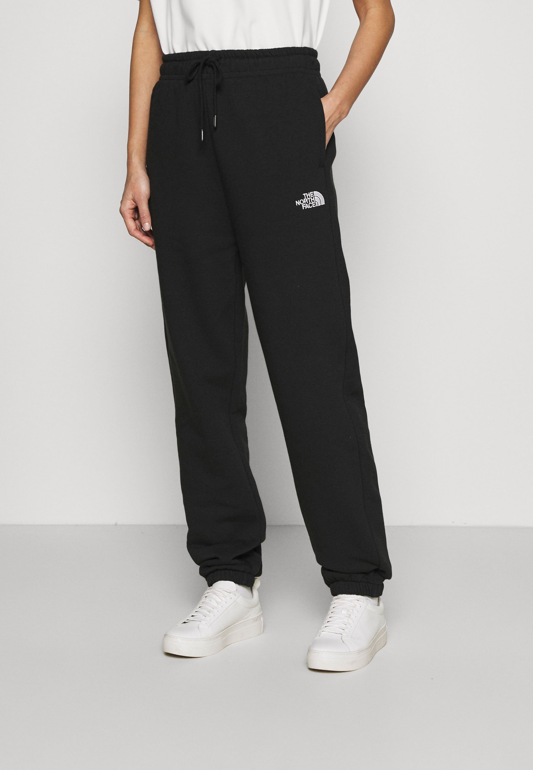 black and grey north face tracksuit