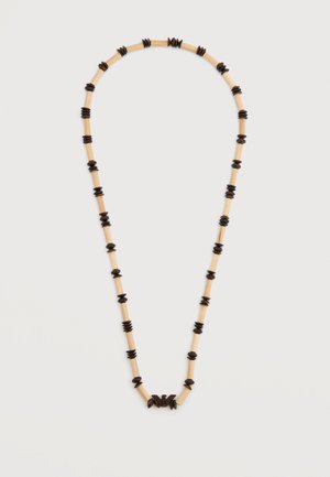 Halskette mit abwechselnden beigen zylindrischen und dunklen runden Perlen, mit einem dunklen Verschluss, auf einem schlichten weißen Hintergrund präsentiert.