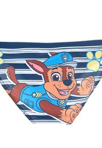 Jungen-Badeshorts mit einem Cartoon-Hund in blauer Polizeiuniform auf einem marineblauen Hintergrund, ausgestattet mit Streifen und gelben Pfotenabdrücken.