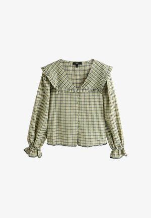 Bluzka w żółto-zieloną kratę z długim rękawem, z falbanianym kwadratowym kołnierzem, zapięciem na guziki z przodu oraz falbanianymi mankietami z czarną lamówką.