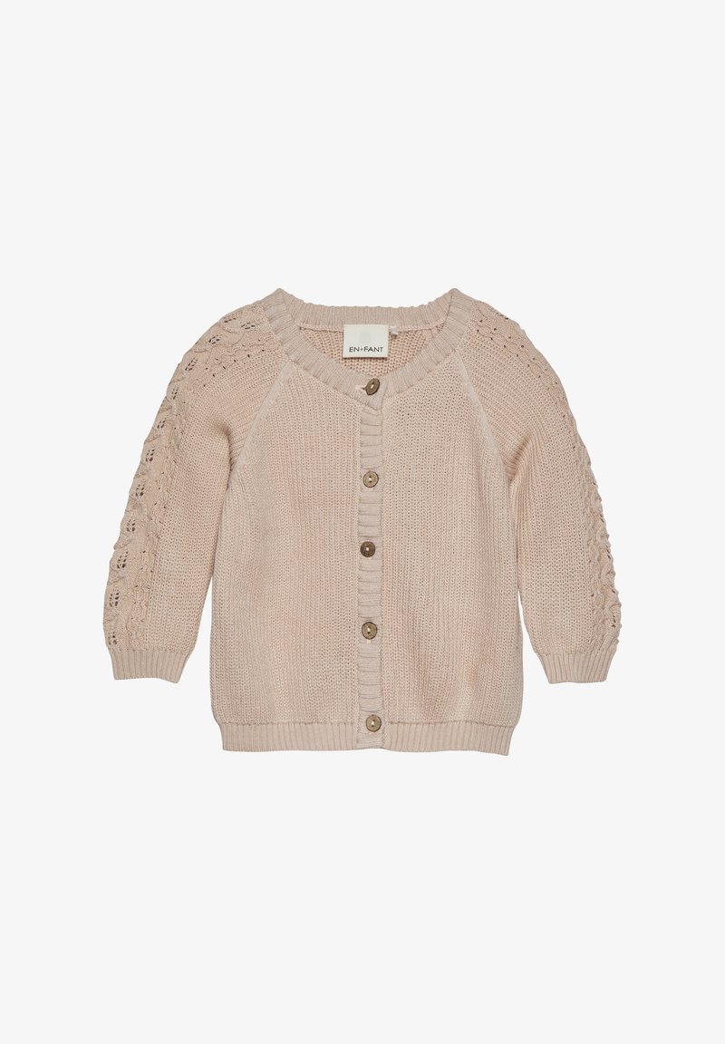 Beige strikket cardigan med en struktureret søm og dekorative hulmønstre på ærmerne, med knaplukning foran og ribbet kant.