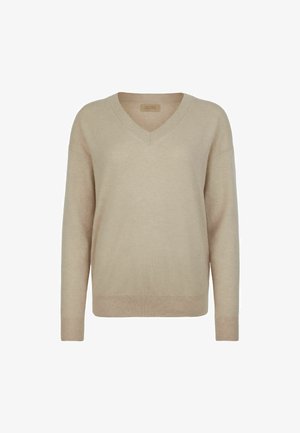 Beige V-ringad tröja gjord av mjukt stickat material. Har en avslappnad passform med långa ärmar samt ribbade muddar och fåll. Minimalistisk design.