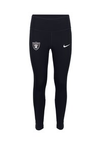 Zwarte legging van rekbaar materiaal, met een Raiders logo op de linkerdij en een witte Nike swoosh aan de rechterkant.
