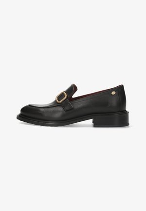 Black leather loafer with a rounded toe, low block heel, and gold buckle detail. Smooth texture with a contrasting burgundy lining.