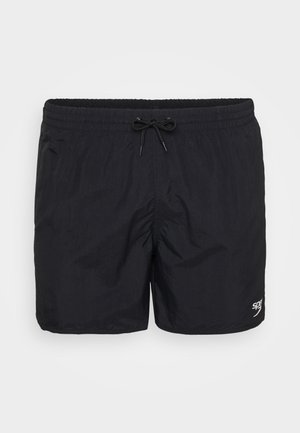 Schwarze Badeshorts aus leichtem Material, mit einem elastischen Bund und Kordelzug, sowie einem kleinen Logo auf der linken unteren Seite.