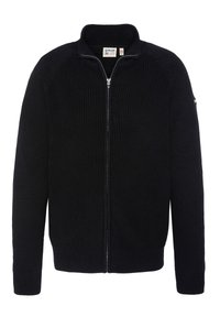 Svart stickad zip-up tröja med hög krage, ribbad struktur och åtsittande mudd. Enkelt mönster med minimala metallaccent.