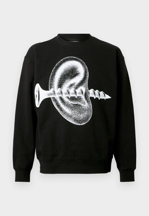 Sudadera negra con un gran gráfico blanco de una oreja y un tornillo, con mangas largas y cuello redondo. Textura de tela suave.