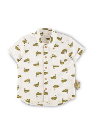 Short-sleeve button-up shirt in white cotton, featuring a green chameleon print, two front buttons, a chest pocket, and a decorative tag.